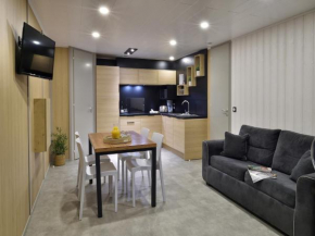 Chalet in a holiday complex with direct sea access